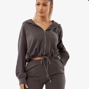 Grey cropped/tied up sweater